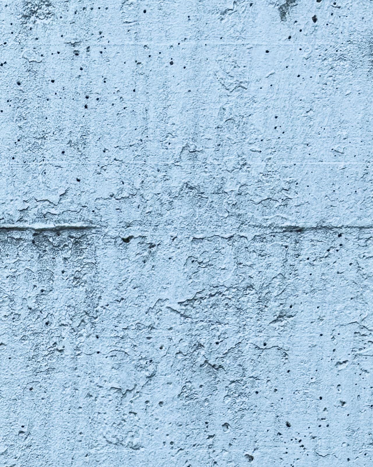 Weathered concrete wall surface in Zeltweg.