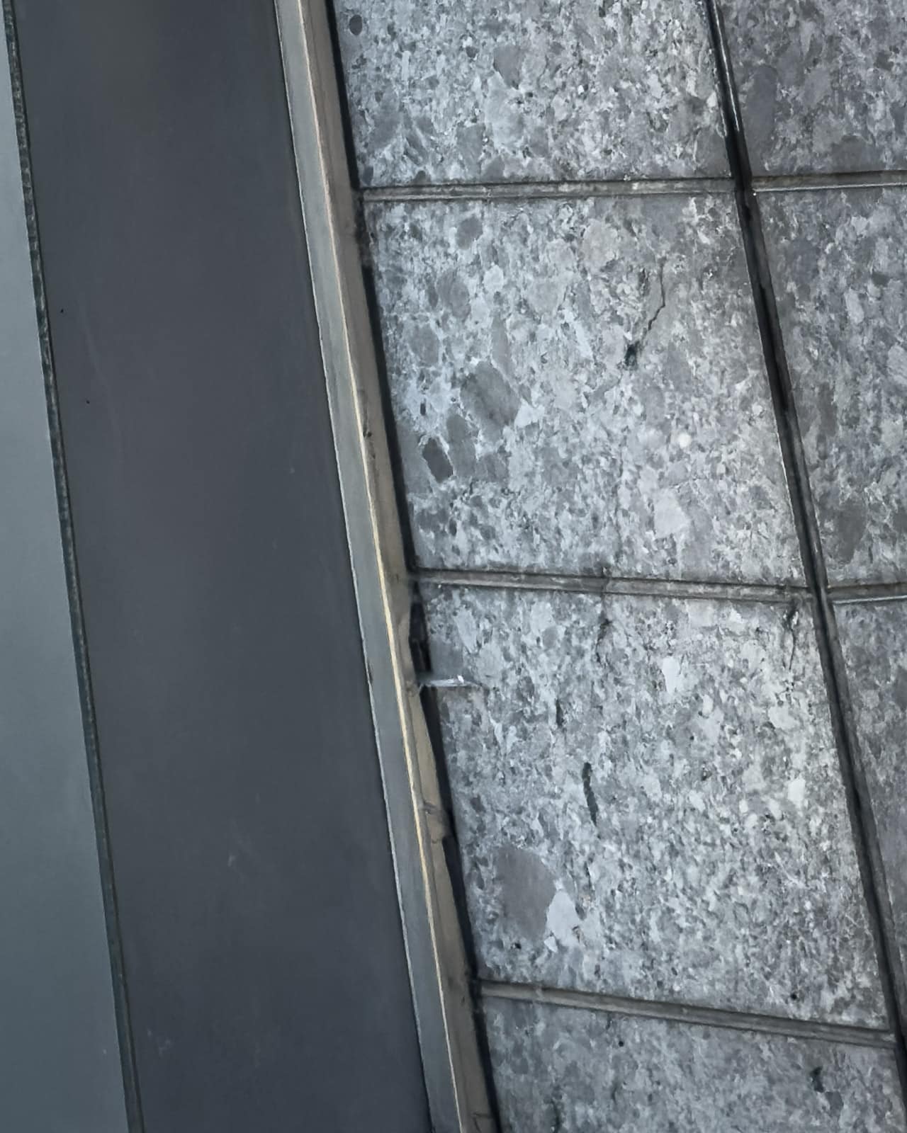 Stone and concrete wall detail at the base of the former cinema in Zeltweg.